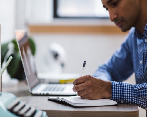 Man taking a break from computer looking away